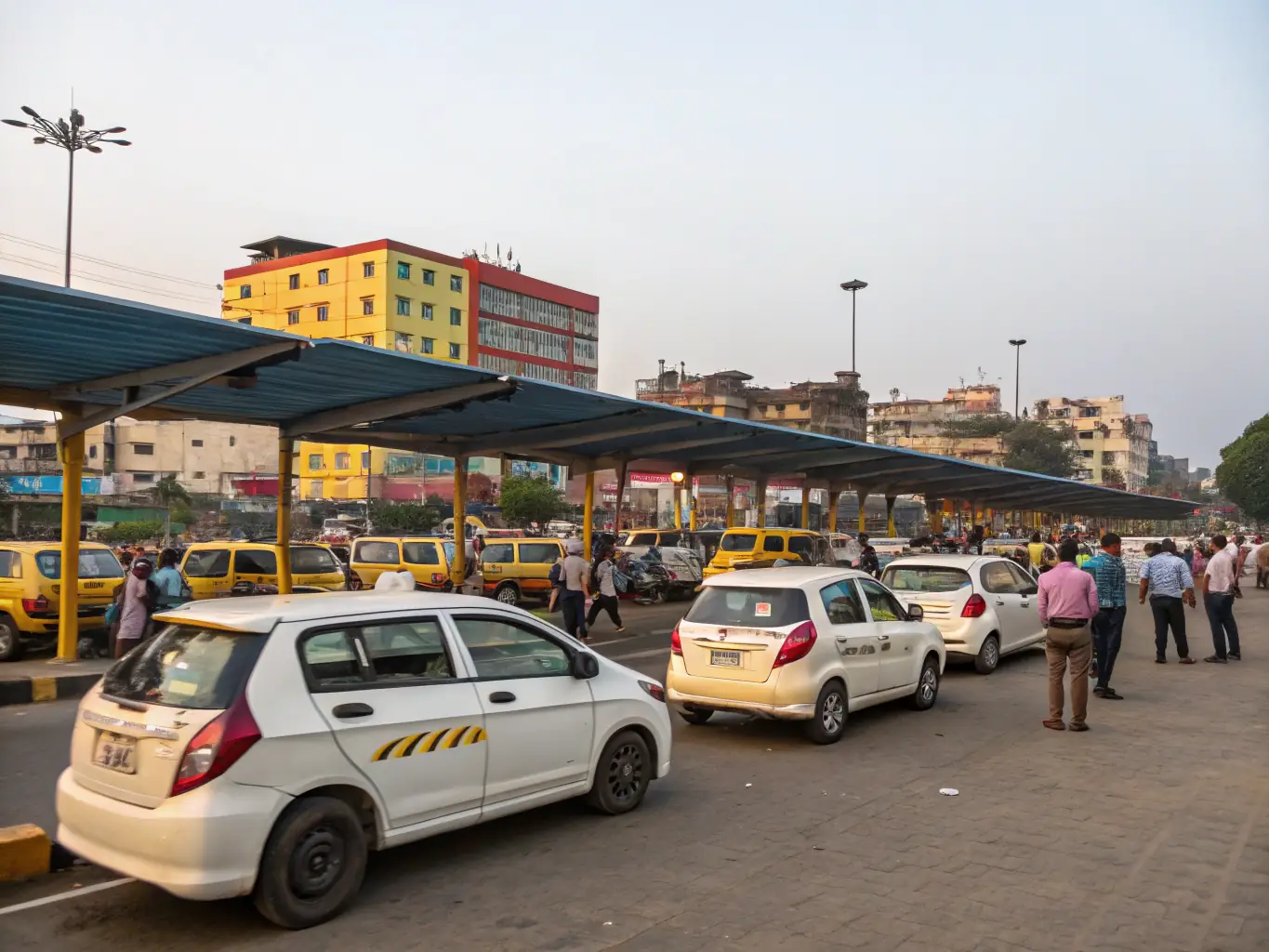 A professional photograph of a taxi stand with several taxis lined up, with a clear blue sky in the background, symbolizing accessibility and availability.